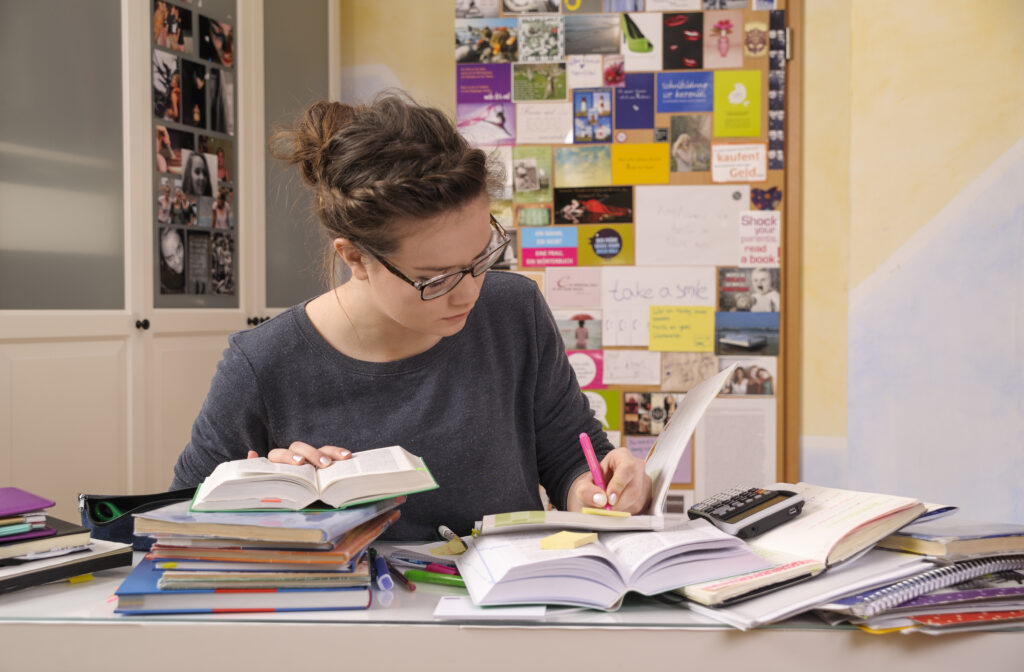 female pupil doing homework